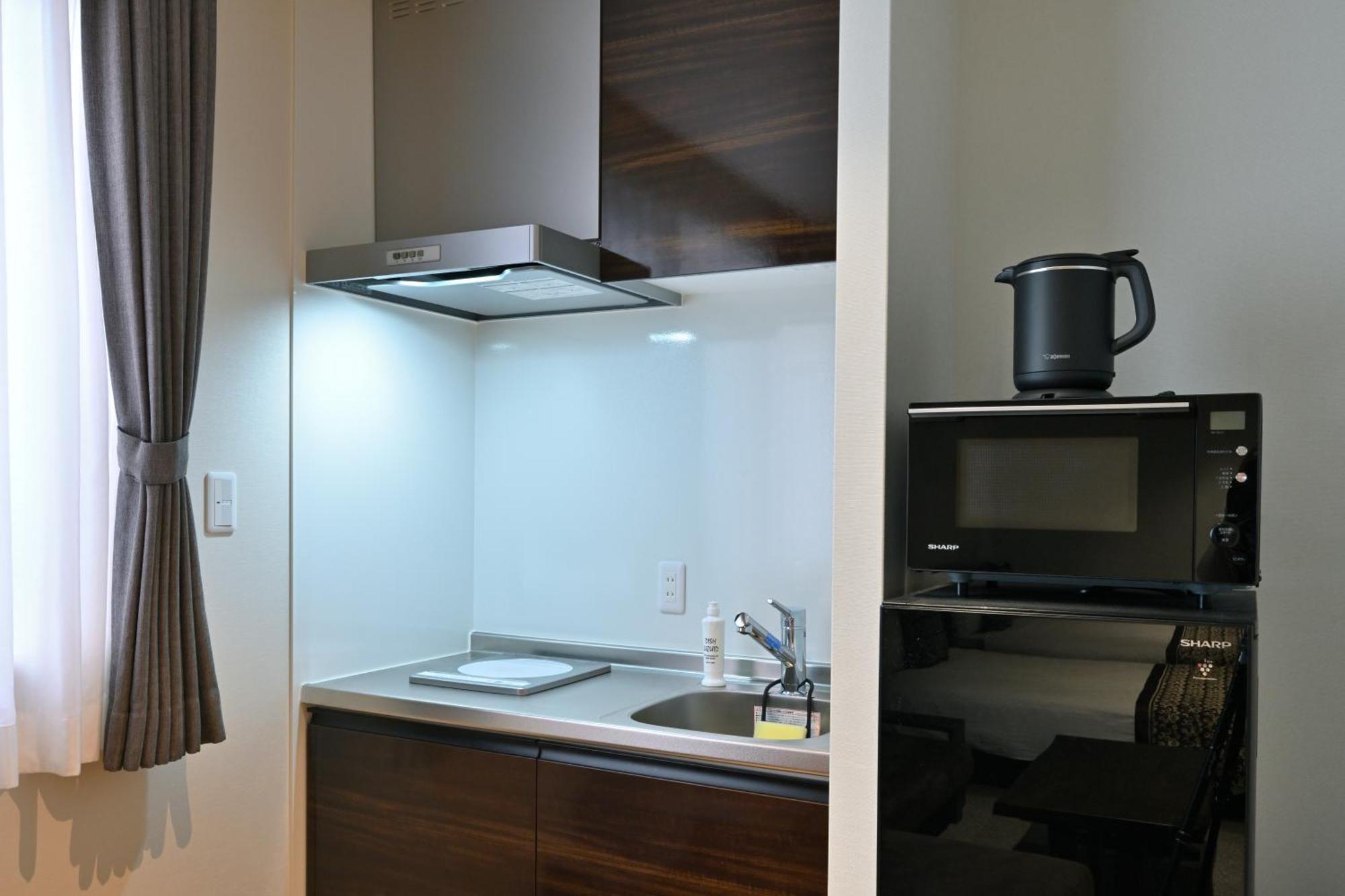 Grand Base Hiroshima Peace Memorial Park Aparthotel Room photo